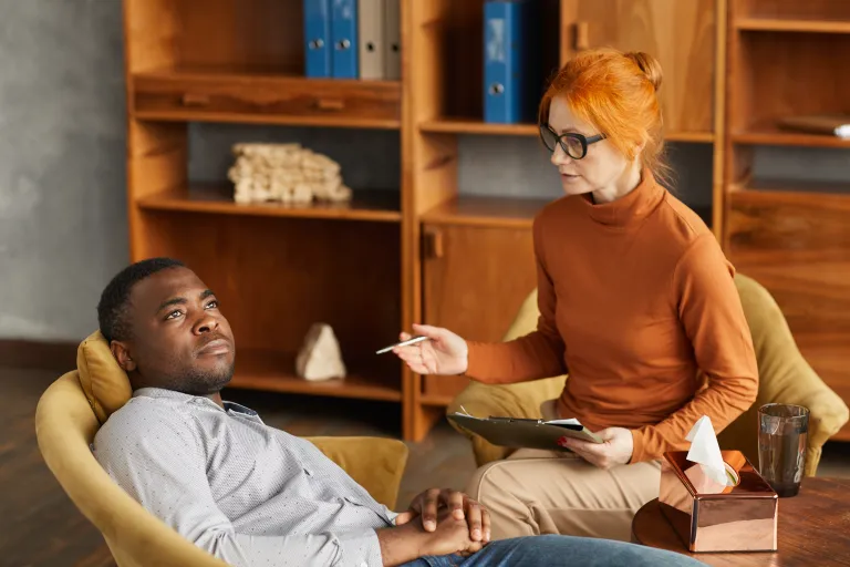Client in a one-on-one individual therapy session with a counselor