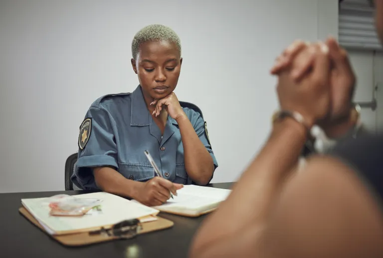 Police officer in a confidential, supportive counseling session