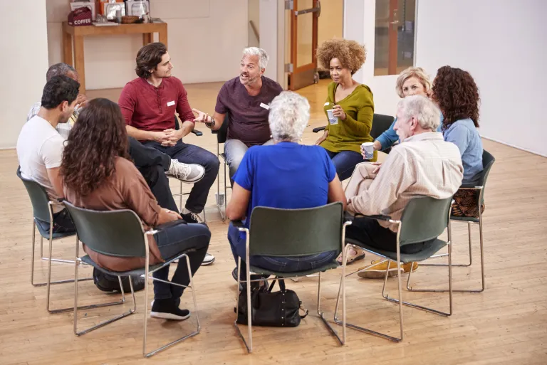 Supportive group circle during a trauma processing session